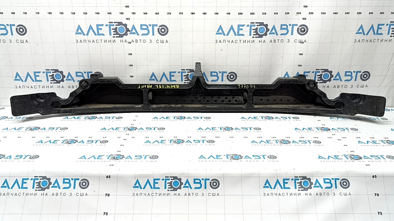 The upper front bumper absorber of a Toyota Rav4 19-24 is broken and missing fragments.