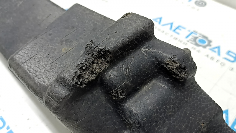 The upper front bumper absorber of a Toyota Rav4 19-24 is broken and missing fragments.
