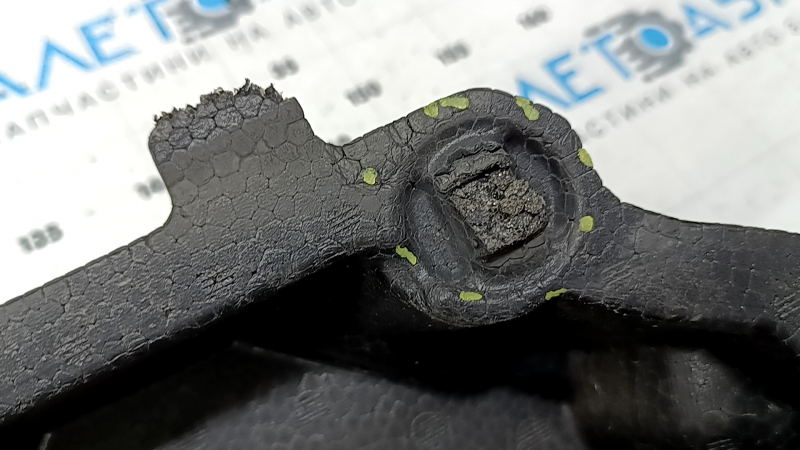 The upper front bumper absorber of a Toyota Rav4 19-24 is broken and missing fragments.