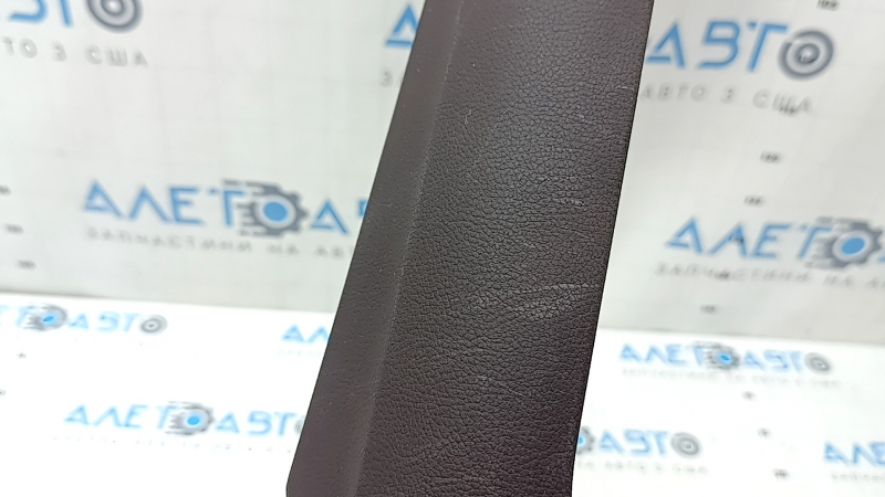 The front panel center trim for Lexus ES 19-22 is brown and worn