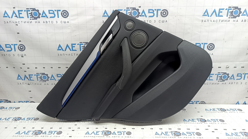 Door trim, rear left card, BMW X1 F48 16-22, Sensatec leather, black, armrest and handle, black leather, aluminum molding with blue insert, with chrome opening handle, with backlighting and speaker grilles, under the tweeter, worn