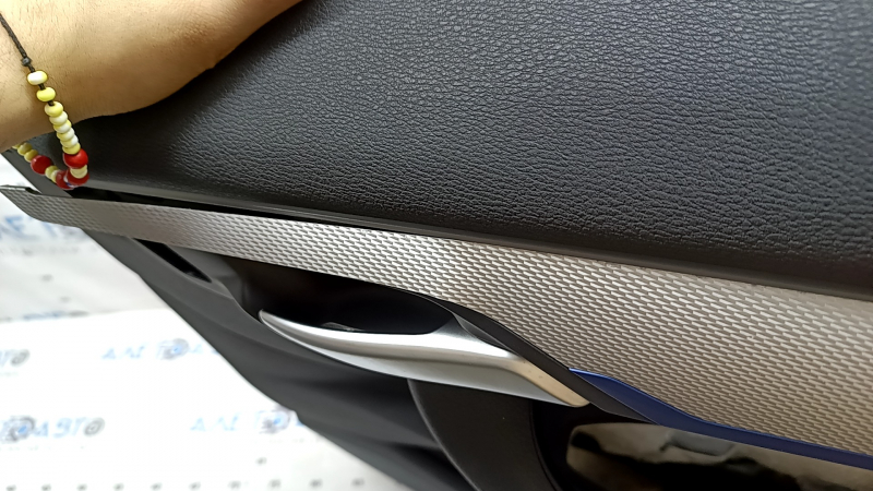 Door trim, front right card, BMW X1 F48 16-22, Sensatec leather, black, armrest and handle, black leather, aluminum molding with blue insert, with chrome opening handle, with backlight and speaker grille, worn, bent molding
