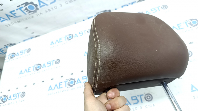 Headrest 2nd row right VW Atlas 21-23 brown leather, white stitching, dry cleanable, scratches