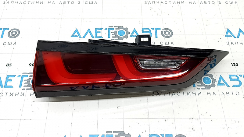 The inner light of the trunk door, left, Honda CRV 23-26, is worn