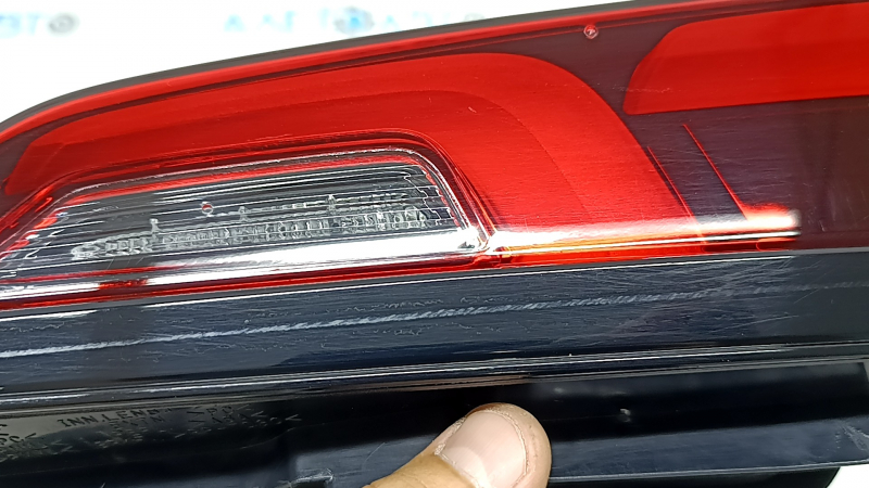 The inner light of the trunk door, left, Honda CRV 23-26, is worn