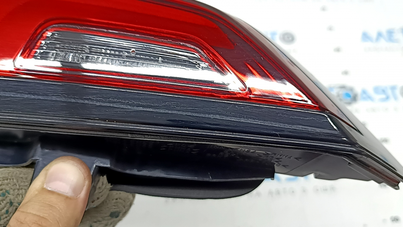 The inner light of the trunk door, right, Honda CRV 23-26, is worn