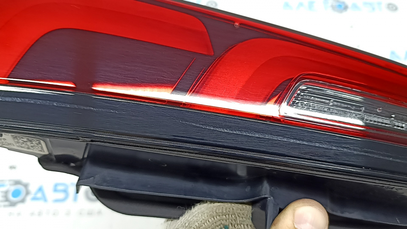The inner light of the trunk door, right, Honda CRV 23-26, is worn