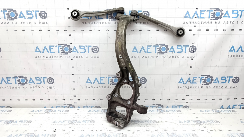 Front left axle of Audi Q7 16-26 with levers, torn silent blocks, broken bolt