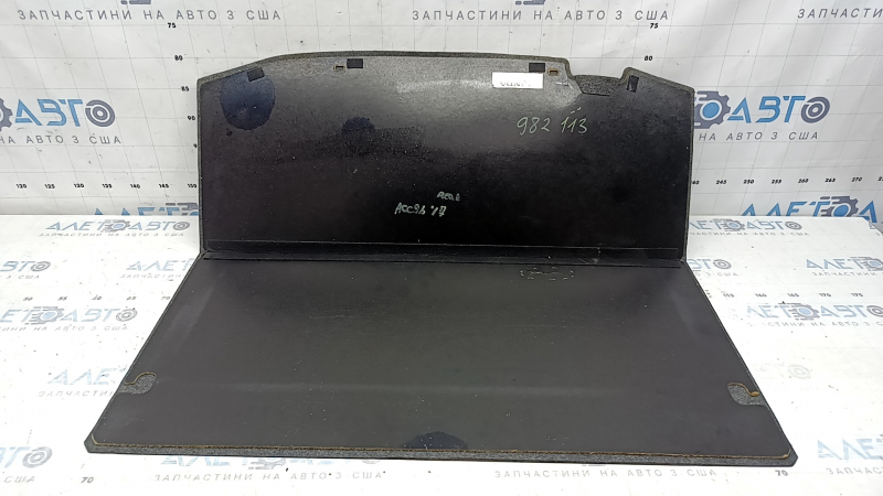 Trunk floor of Honda Accord 17 hybrid, gray, needs cleaning, dented, cracks