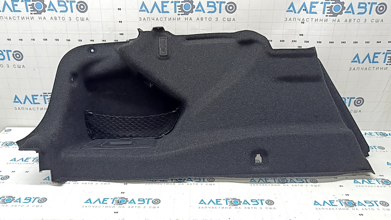 Left arch trim BMW 5 G30 17-23 black, under the first aid kit, scratches on the trim, broken mesh mount