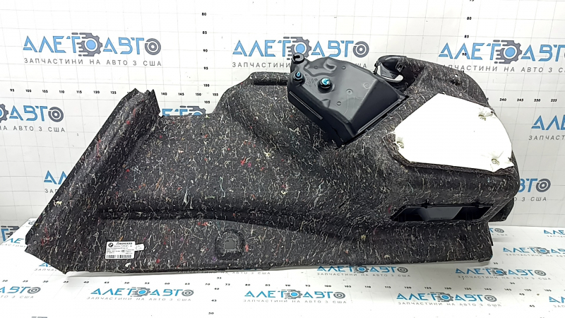 Left arch trim BMW 5 G30 17-23 black, under the first aid kit, scratches on the trim, broken mesh mount