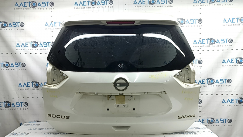 The trunk door is bare with glass for Nissan Rogue 18-20, electric drive, white QAB, with a brake light, with an overlay and license plate light