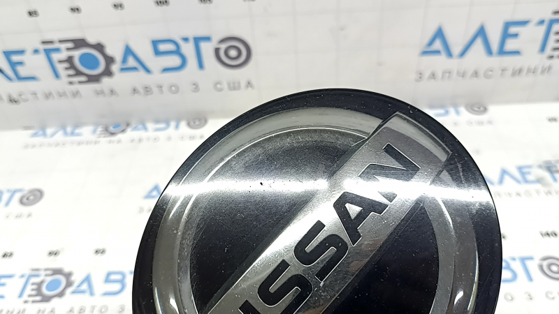 Nissan Rogue 17-20 front grille emblem round, radar-like, sand