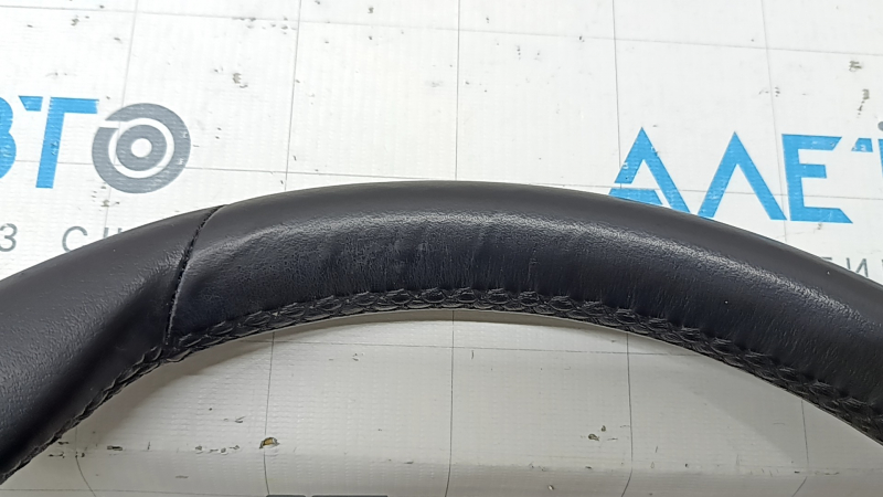 The steering wheel is bare BMW 5 G30 17-23 leather black, with heating, with driving assist, with paddle shifters, dented, the leather has peeled off