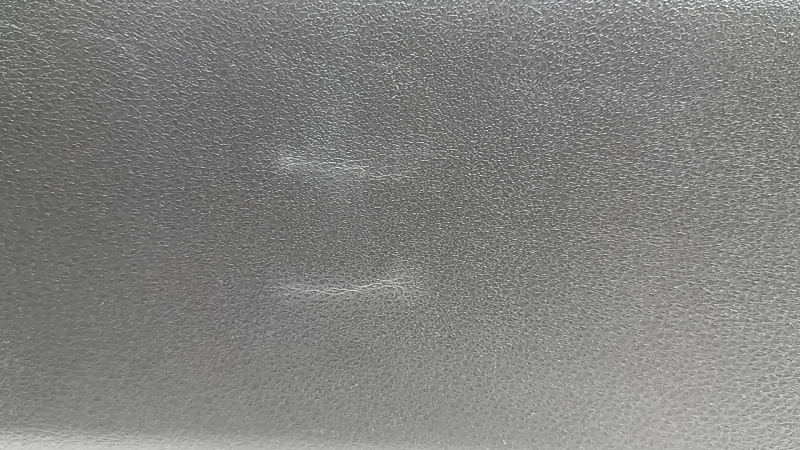 The lower trim of the trunk door of the Nissan Ariya 23-26 is black, there are scratches, the plastic has turned white, the fastener is broken