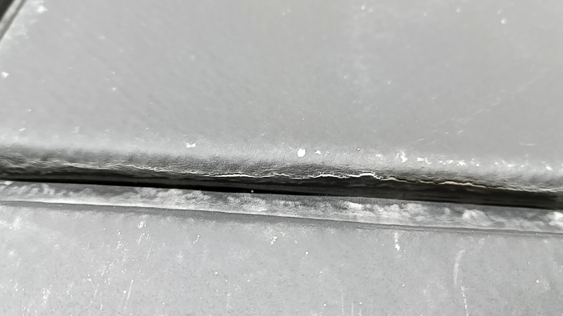 Trunk mat fabric front right VW Tiguan 18-24 black for 3 rows, cracked, needs cleaning