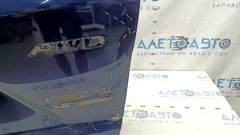 The trunk door is bare, Honda CRV 17-22, electric, blue B-588P, dented, metal torn, sealant cracked