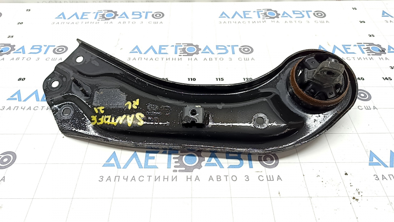 The rear left longitudinal arm of Hyundai Santa FE 21-23 has a torn silent block