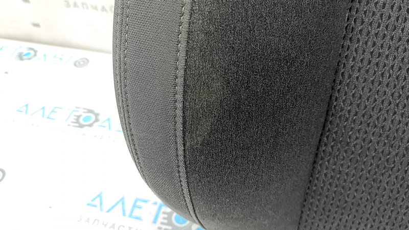 The upholstery of the back of the passenger seat of Hyundai Santa FE 21-23 is black fabric, heated, and can be cleaned