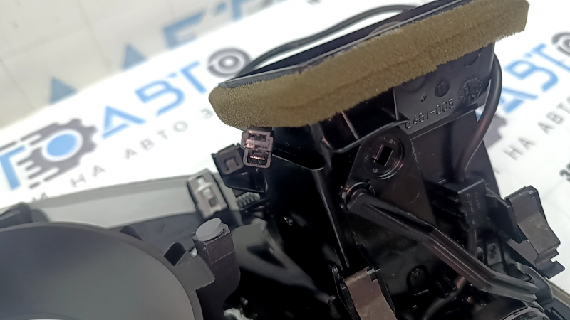 The front panel trim of the instrument panel frame of the Audi A4 B8 08-15 is gray, with an air duct, a crack in the mount