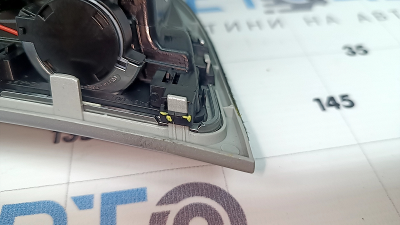 The front panel trim of the instrument panel frame of the Audi A4 B8 08-15 is gray, with an air duct, a crack in the mount