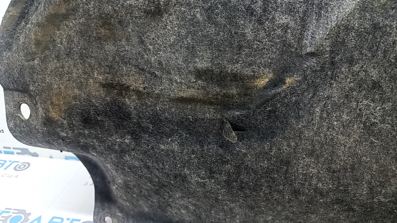 The left underbody protection of Honda CRV 20-22 AWD is worn and torn