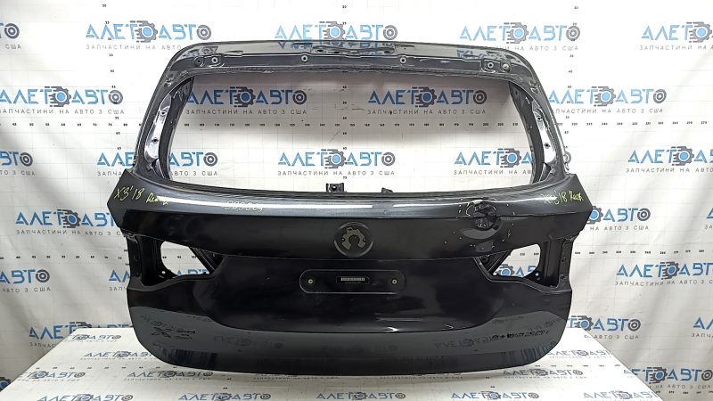 The trunk door is bare BMW X3 G01 18-24 graphite A90M, dented