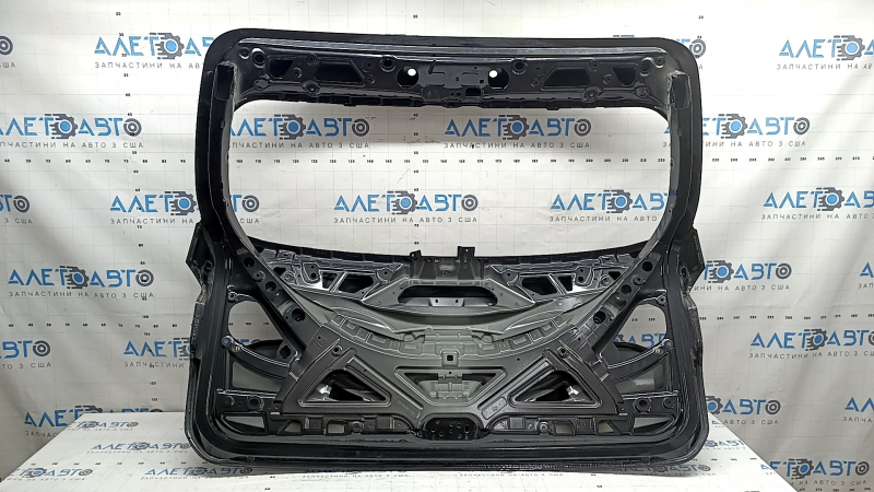 The trunk door is bare BMW X3 G01 18-24 graphite A90M, dented