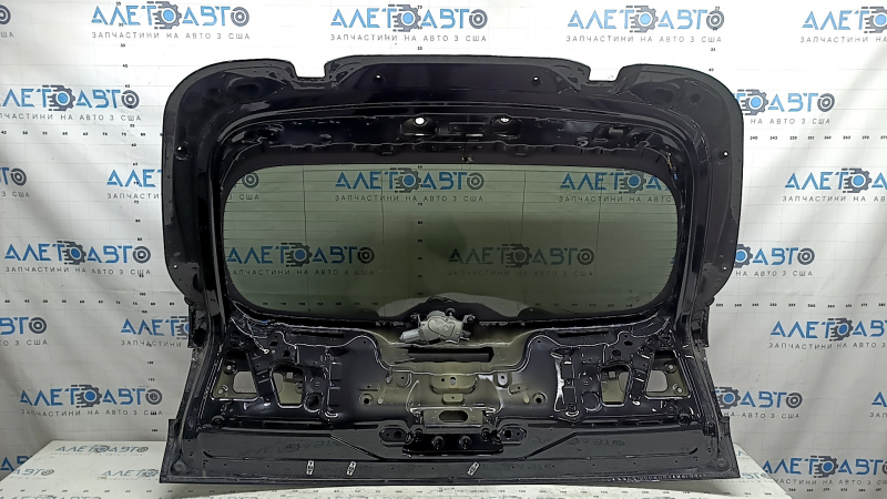 The trunk door is bare with glass, the upper part of the BMW X5 G05 19-26 black 475, with a trapezoid