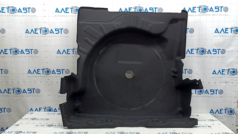 The trunk floor trim of the Mercedes X167 GLS 450 580 20-26 is black, torn, and needs dry cleaning