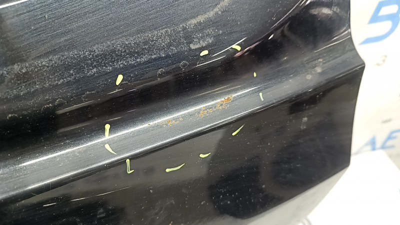 The trunk door is bare, lower part of the BMW X7 G07 19-26 black 475, dented, corrosion