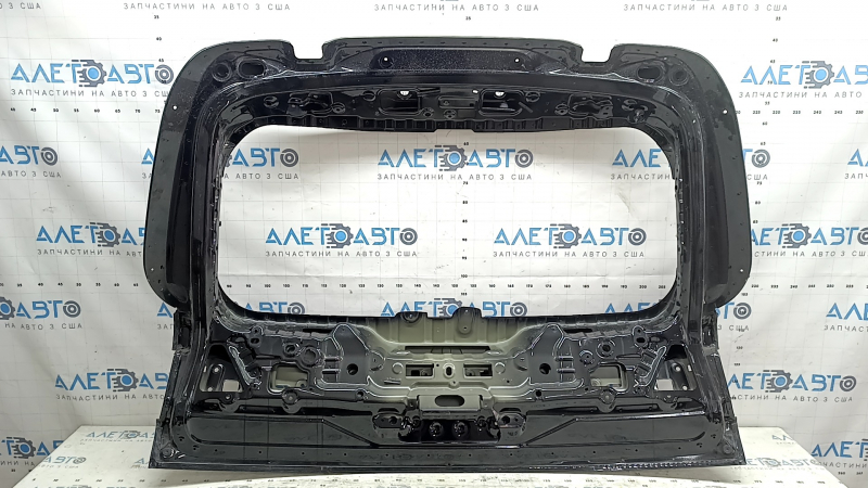 The trunk door is bare, the upper part of the BMW X7 G07 19-26 black 475, dented, bumped, in glue