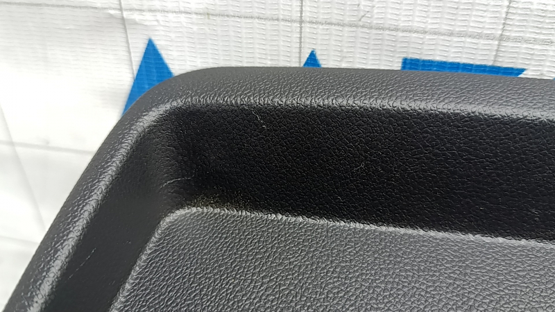 Rear lower center console trim for Chevrolet Equinox EV 24-26, black, scratches, chips