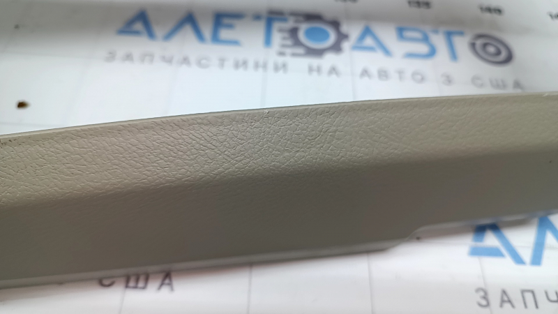 Toyota Camry v40 07-11 driver's knee dashboard trim, beige, under 2 buttons, scratches