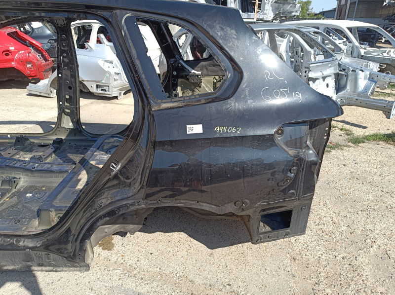 Quarter wing rear left BMW X5 G05 19-26 on the body, black