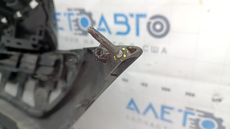 The radiator grille assembly for a Toyota Prius 50 Prime 17-19 with an emblem, under a radar, without parking sensors, cracked, chipped, and a broken mount