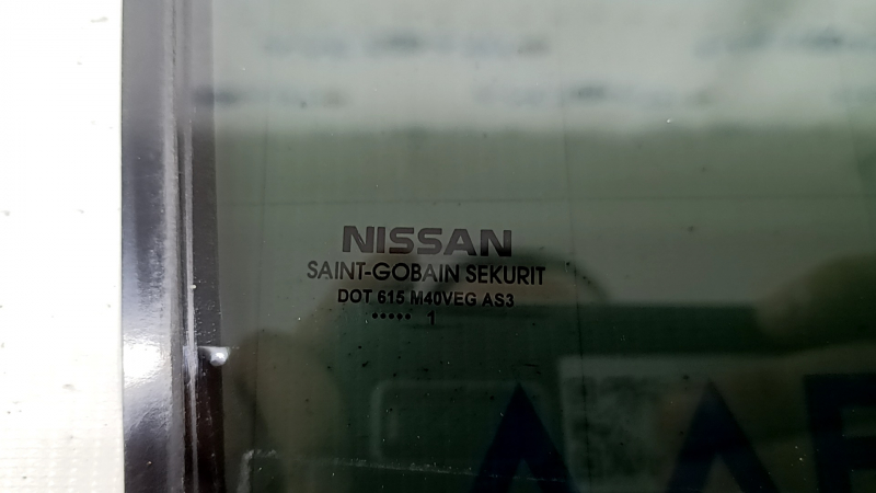 Rear right door glass Nissan Rogue 21-26 US built, tinted, sand