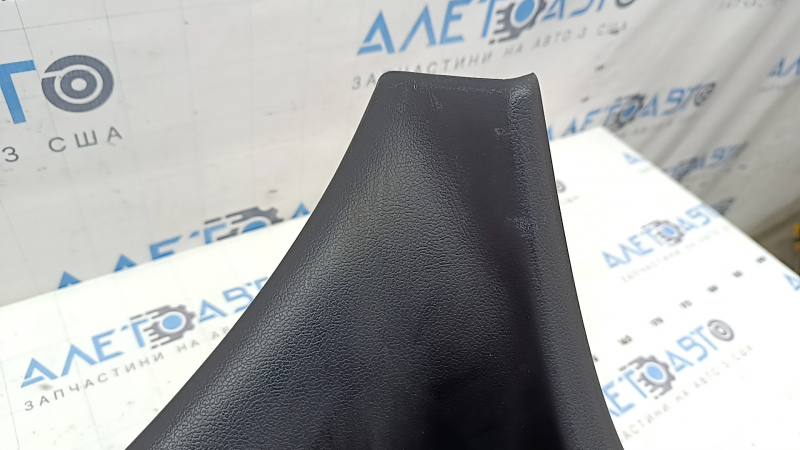 The central trim of the trunk door of Toyota Prius 50 Prime 17-22 is black, worn