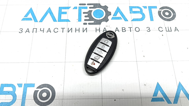 Nissan Rogue 21-22 SV key, 5 buttons, scratches, chrome is missing