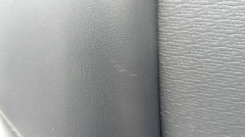 Back of rear row of seats 2nd row right Nissan Rogue 21-22 black leather, scratches