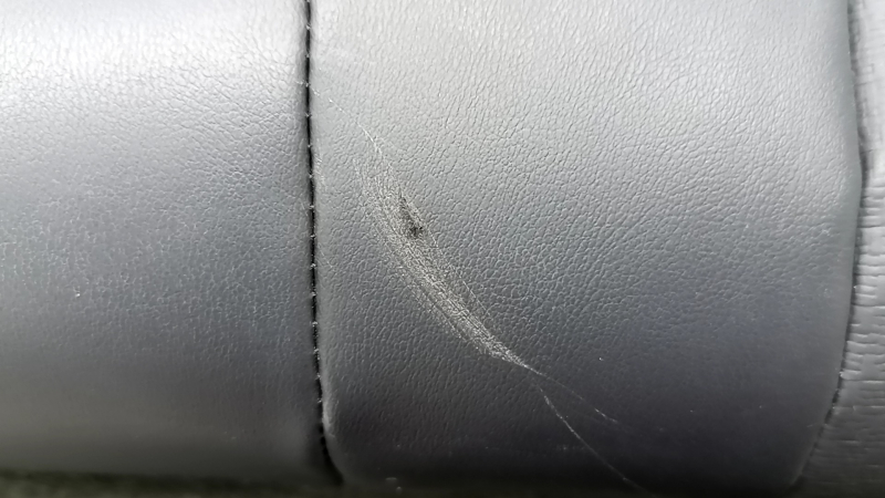 Rear seat back, 2nd row, left, Nissan Rogue 21-22, black leather with black belt, scratches, needs cleaning