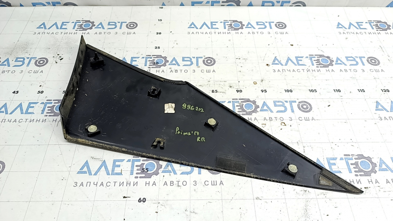 The right rear fender trim of a Toyota Prius 50 Prime 17-22 has peeling paint and is cracked
