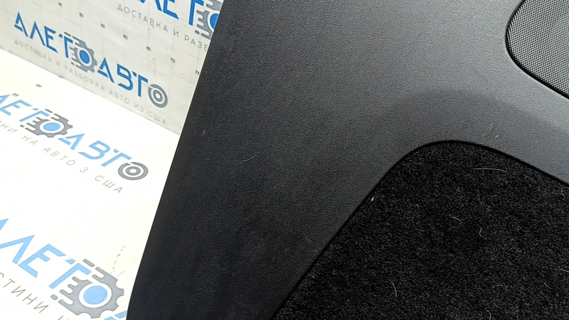 Tesla Model Y 20-25 black lower trunk door trim, with speaker grilles, scratches, needs cleaning