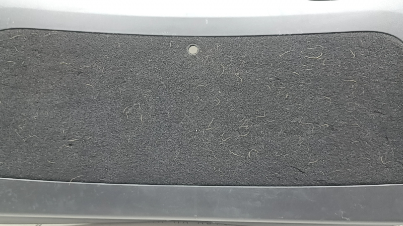 Tesla Model Y 20-25 black lower trunk door trim, with speaker grilles, scratches, needs cleaning