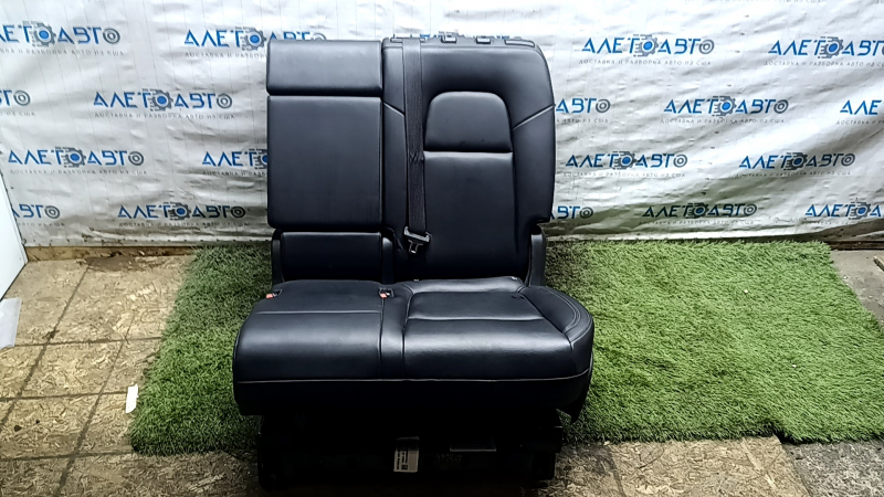 Rear row of seats, 2nd row, left, Tesla Model Y 20-25, black leather, mechanical, heated, scratches