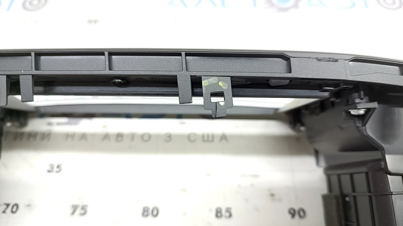 The front panel center trim with air vents for the Hyundai Ioniq 17-19 is black with chrome and beige insert, the mount is cracked