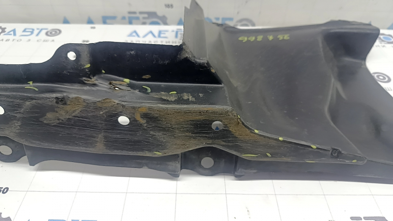 The left side engine protection of Toyota Prius 50 16-18 is worn, torn, and dented