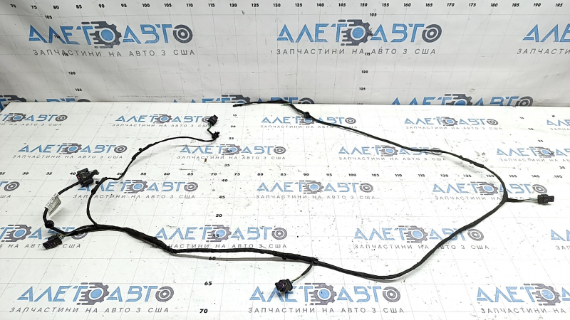 Wiring for the rear bumper of a BMW 3 G20 19-22 for parking sensors, the left part of the wiring is cut off