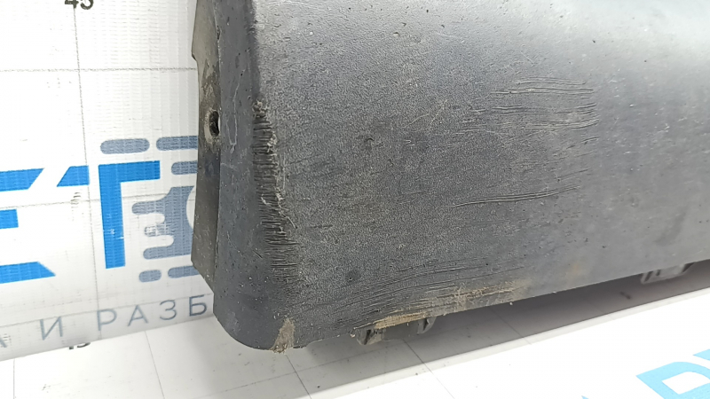 Upper left threshold of Tesla Model Y 20-25 structure, scratches