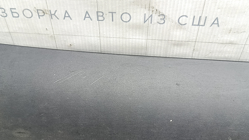Upper left threshold of Tesla Model Y 20-25 structure, scratches
